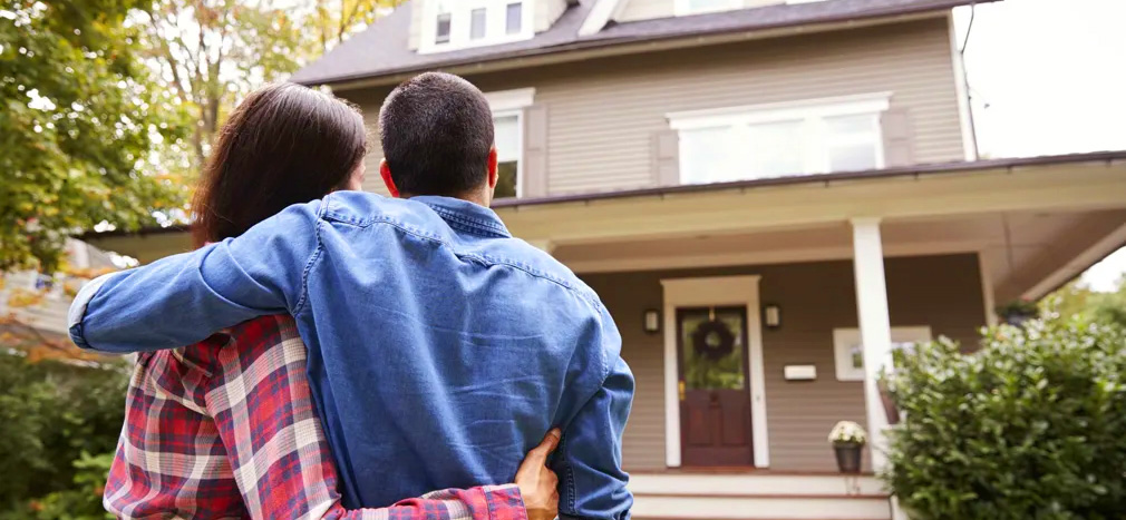 couple looking at new home